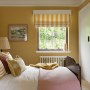 St Timothee | St Timothee yellow guest bedoom 1 | Interior Designers